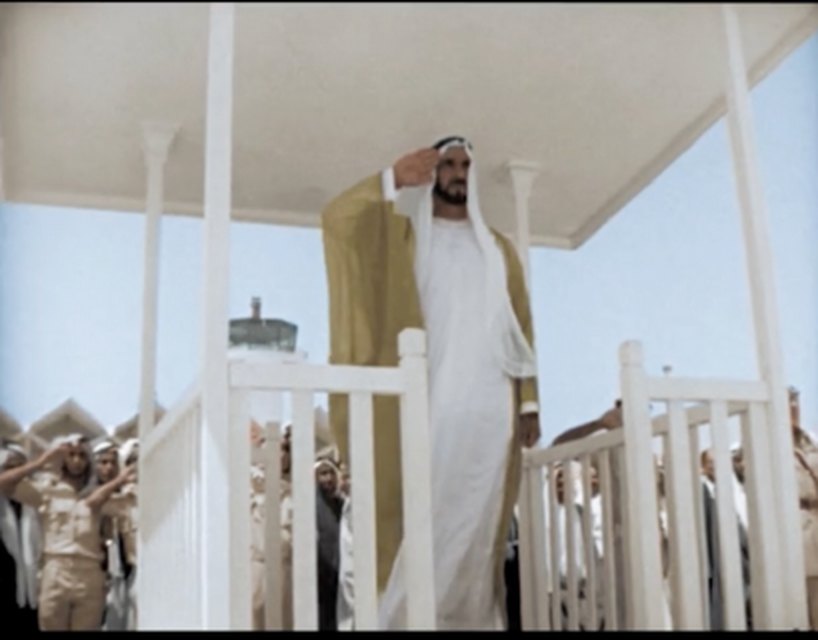 The same frame after restoration and colorization